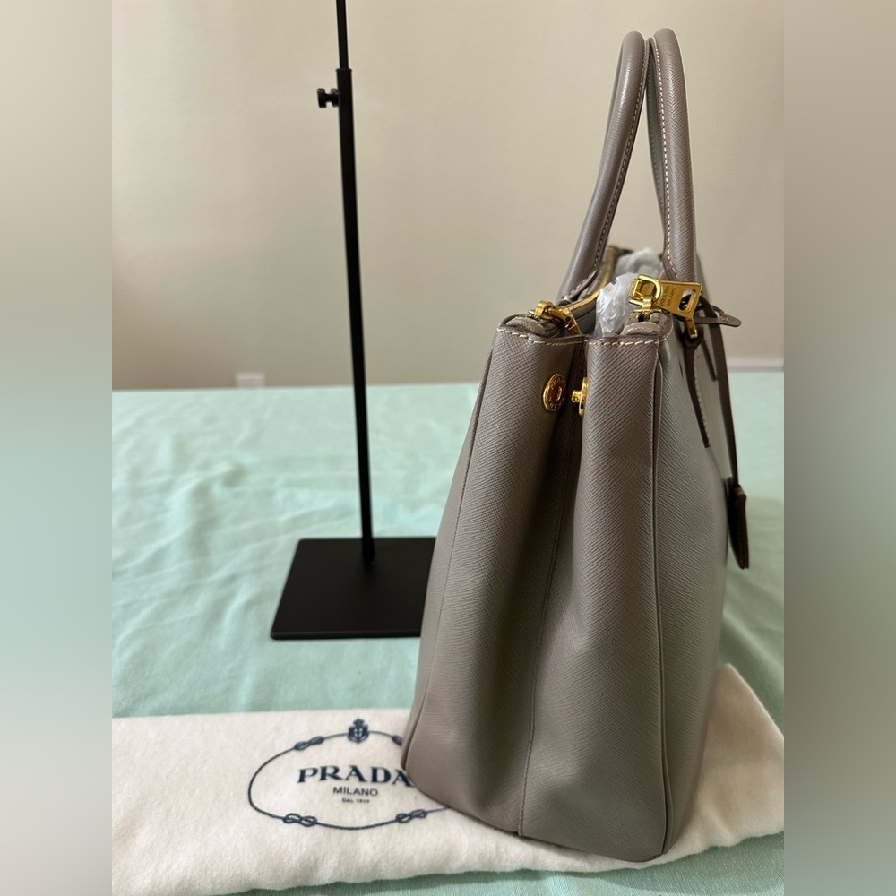Prada Taupe Leather Handbag with Gold Accents - Picture 3 of 15